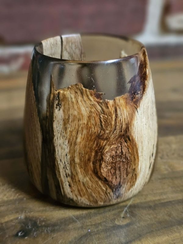 Spalted whiskey glass with a swirling knot in clear resin